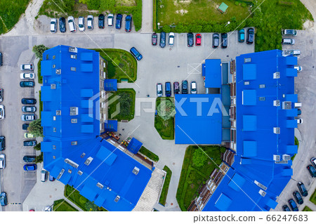 Aerial view of the housing estate with blue roofs. 66247683