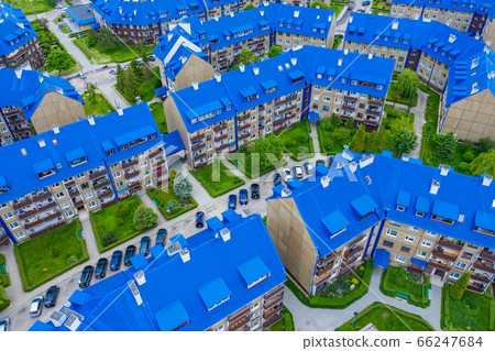 Aerial view of the housing estate with blue roofs. 66247684