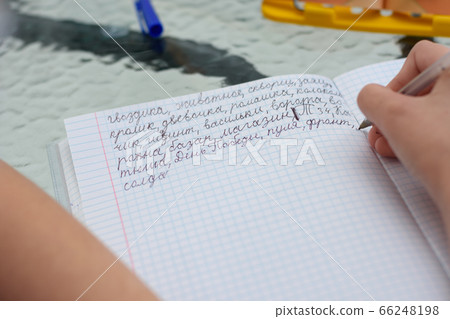 The child learns to write letters correctly and 66248198