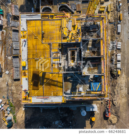 Aerial view of construcion site. People working. Aerial view of construcion site. People working. 66248681