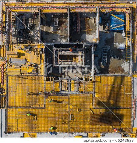 Aerial view of construcion site. People working. Aerial view of construcion site. People working. 66248682
