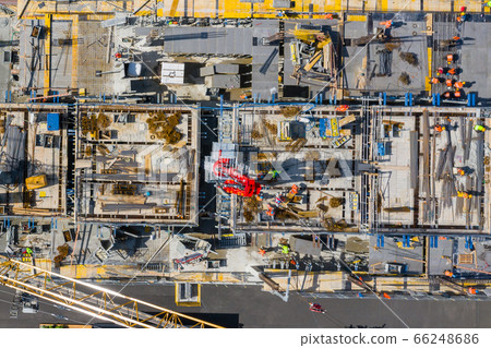 Aerial view of construcion site. People working. Aerial view of construcion site. People working. 66248686