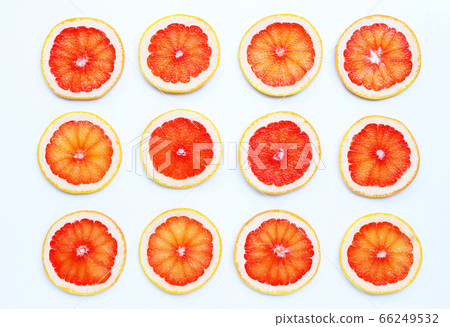 High vitamin C. Juicy grapefruit slices on white High vitamin C. Juicy grapefruit slices on white 66249532
