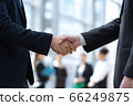 Business handshake close-up on a office background. 66249875
