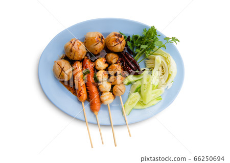 Meatballs toasted on wood dish and a sauce 66250694