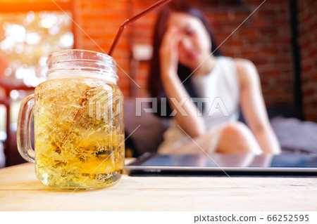 Beautiful woman in depression, drinking alcohol in Beautiful woman in depression, drinking alcohol in 66252595