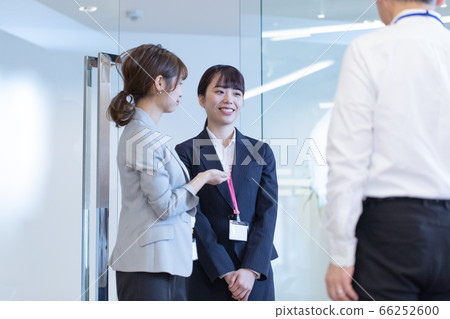 Senior employees introducing new employees Senior employees introducing new employees 66252600