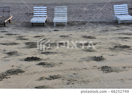 Cox's Bazar Beach, which is said to be the longest beach in Bangladesh. Natural sand beach and deck chairs installed. 66252749
