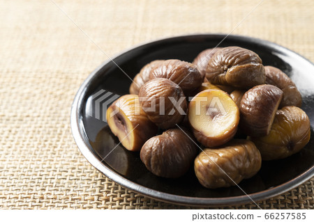 Sweet chestnuts on a white background 66257585