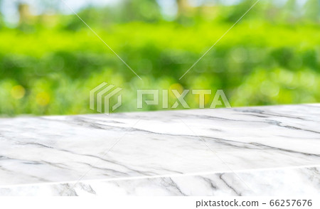 spring background.Empty diagonal white mable table 66257676