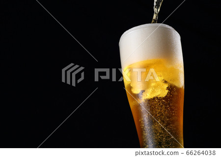 Draft beer, black background Draft beer, black background 66264038