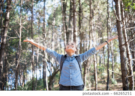 Young hipster happy woman enjoy nature in forest Young hipster happy woman enjoy nature in forest 66265251