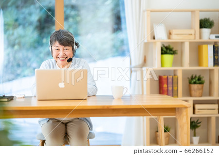 Telework Working from home Grandma using a computer Senior female portrait Silver generation Elderly Female Telework Working from home Grandma using a computer Senior female portrait Silver generation Elderly Female 66266152