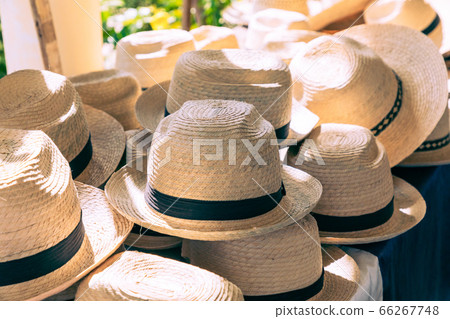 Street market selling hats. Traditional handcrafted merchandise for sale in Trinidad, Cuba. 66267748