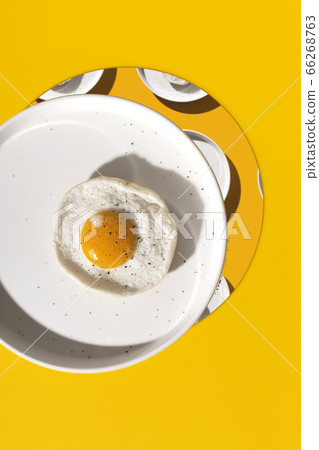 Fried egg in yellow creative zine collage Fried egg in yellow creative zine collage 66268763