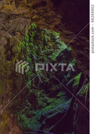 Cave in an extinct volcano on the island of Terceira Gruta do Algar do Carvao. Azores, Portugal Cave in an extinct volcano on the island of Terceira Gruta do Algar do Carvao. Azores, Portugal 66268802