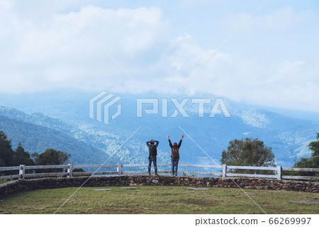 Couples travel nature at sheep farm at Doi Pha Tang, Doi Inthanon National Park, Chom Thong 66269997
