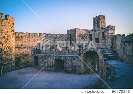 Rhodes old town stone walls in the evening. Rhodes old town stone walls in the evening. 66270808