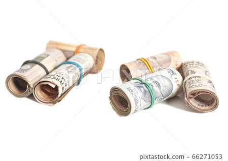 Rolls of Indian rupees isolated on white Rolls of Indian rupees isolated on white 66271053
