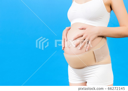Cropped image of pregnant woman in underwear Cropped image of pregnant woman in underwear 66272145