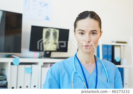 Portrait of Young Female Medic in Clinic Portrait of Young Female Medic in Clinic 66273232
