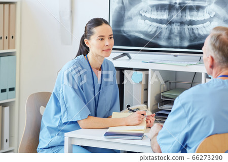 Two Medics Talking in Clinic 66273290