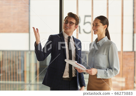 Real Estate Agent Showing Commercial Property 66273883