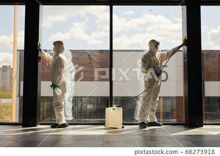 Workers doing Chemical Cleaning Indoors 66273918