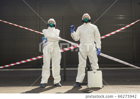 Two Disinfection Workers in Danger Zone 66273942