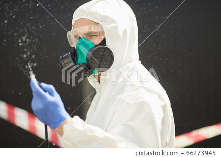 Disinfection Worker in Danger Zone 66273945