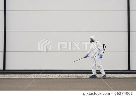 Worker Disinfecting Street Background 66274001