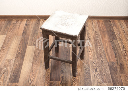 Rustic wooden stool in room interior Rustic wooden stool in room interior 66274070