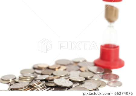 Hourglass On Coins isolated on white 66274076