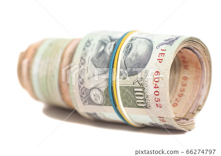 Roll of Indian rupees isolated on white Roll of Indian rupees isolated on white 66274797