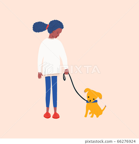 African american girl volunteering in animal shelter walking little puppy. 66276924