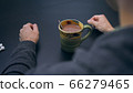 High quality close-up 4k slow motion video of a man mixing hot chocolate beverage 66279465