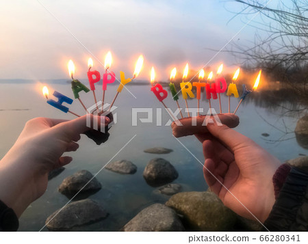 Burning happy birthday inscription made 66280341