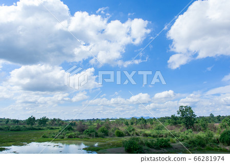 Cirrus and cumulus clouds on blue sky background. Cirrus and cumulus clouds on blue sky background. 66281974