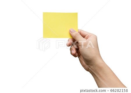 Hand holding yellow paper isolated on white with Hand holding yellow paper isolated on white with 66282158