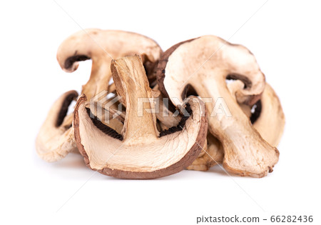 Dried sliced mushrooms isolated on white Dried sliced mushrooms isolated on white 66282436