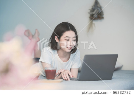woman communicating online woman communicating online 66282782