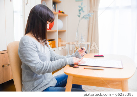 Woman with a seal stamp Copy space 66283393