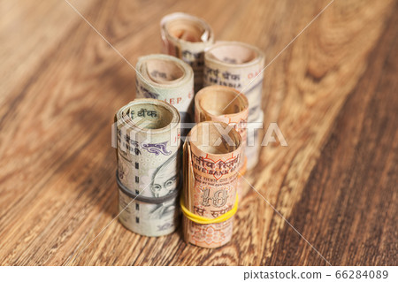 Rolls of Indian rupees Rolls of Indian rupees 66284089