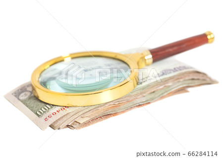 Indian Currency Rupee Notes with magnifying glass Indian Currency Rupee Notes with magnifying glass 66284114
