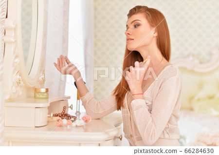 Close up portrait of beautiful young woman Close up portrait of beautiful young woman 66284630