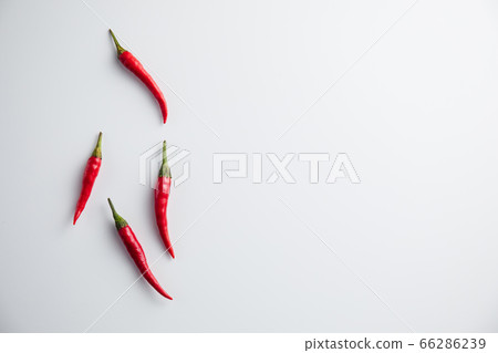 Red pepper on a white background. Minimum concept Red pepper on a white background. Minimum concept 66286239