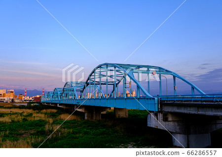 Jintsu Bridge and Tateyama Mountain Range at dusk 66286557
