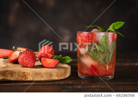 Close up of a cold summer strawberry alcohol free cocktail Close up of a cold summer strawberry alcohol free cocktail 66286566