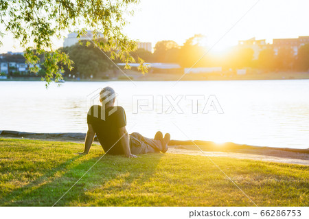 Back view gray hair mature man sitting on the Back view gray hair mature man sitting on the 66286753