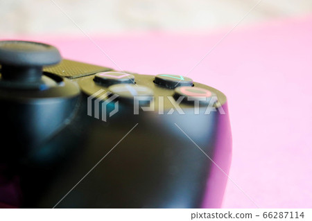 A beautiful black modern digital game joystick A beautiful black modern digital game joystick 66287114